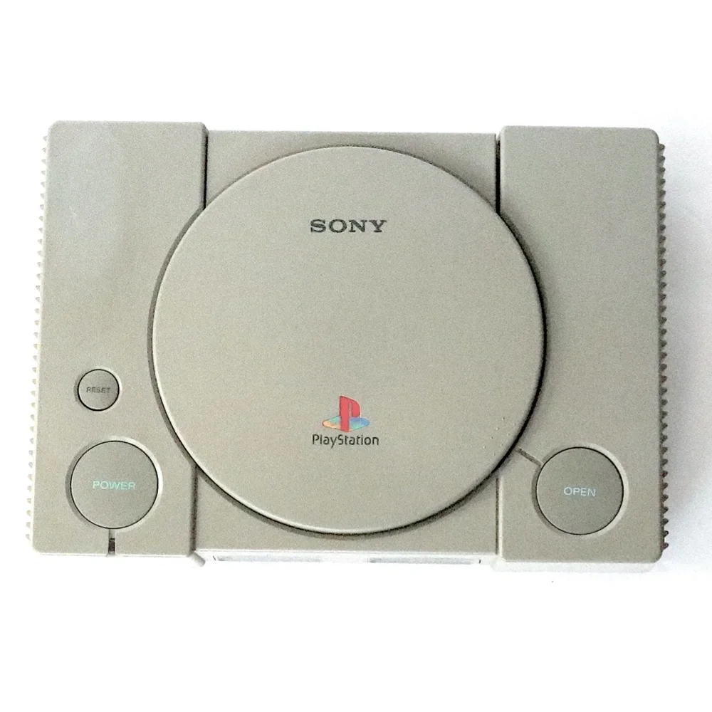 Original Sony Playstation PS1 console + Dual Shock controller + memory cards